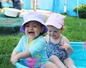picture of toddler children in kiddie pool